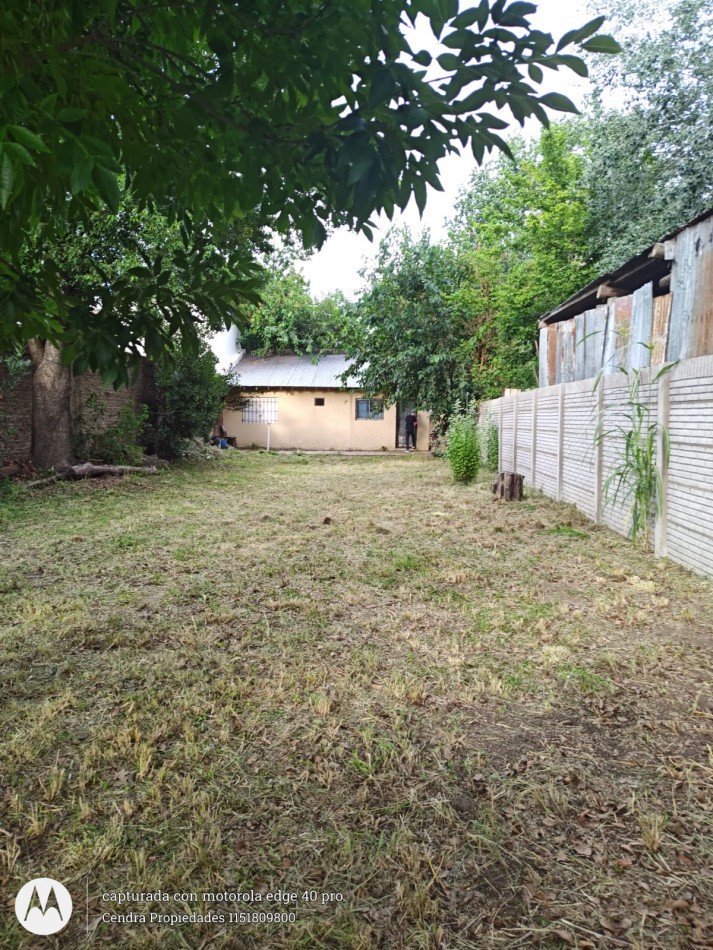 CASA CON AMPLIO TERRENO