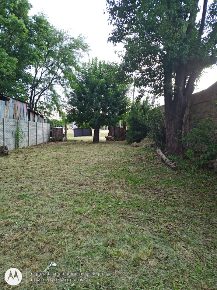 CASA CON AMPLIO TERRENO
